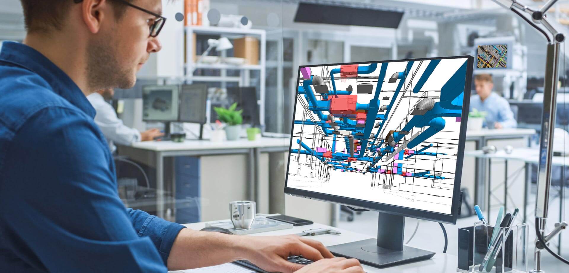 Image of an engineer explaining HVAC blueprints